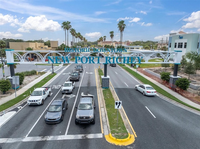 5440 Manatee Point Dr, New Port Richey, FL 34652 - view of asphalt street featuring sidewalks, curbs, and street lighting