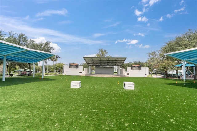 5440 Manatee Point Dr, New Port Richey, FL 34652 - view of green lawn with a carport and a gazebo