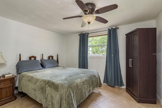 3140 Bahia Ave, Holiday, FL 34690 - bedroom with light tile patterned flooring and a ceiling fan