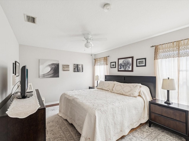 18845 Fairway Green Dr, Hudson, FL 34667 - bedroom with ceiling fan and baseboards