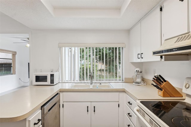 13001 Sawmill Way, Hudson, FL 34667 - kitchen with white appliances, exhaust hood, a sink, and plenty of natural light
