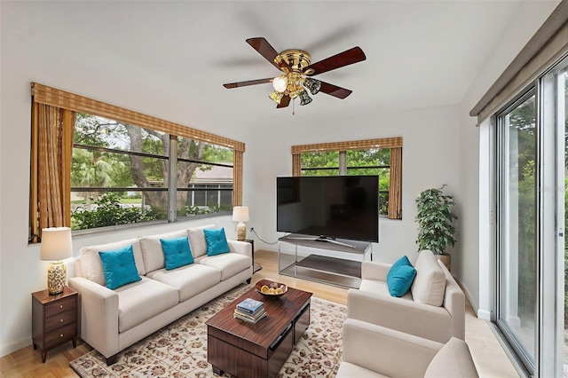 13001 Sawmill Way, Hudson, FL 34667 - living area with a ceiling fan