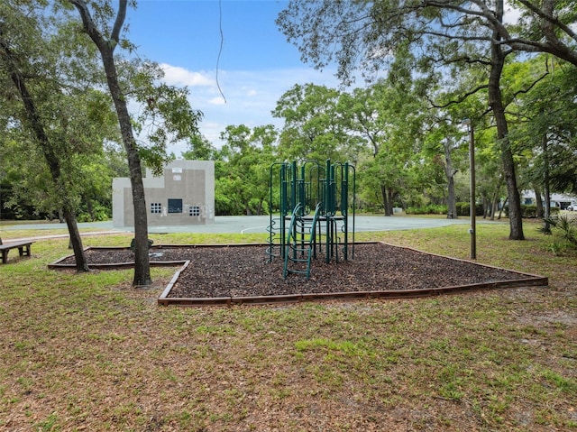 13001 Sawmill Way, Hudson, FL 34667 - community play area with a lawn