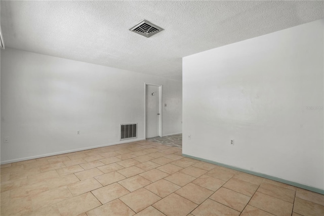 8053 Dedham Dr, Port Richey, FL 34668 - spare room featuring a textured ceiling