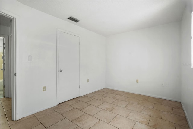 8053 Dedham Dr, Port Richey, FL 34668 - unfurnished room with light tile patterned floors