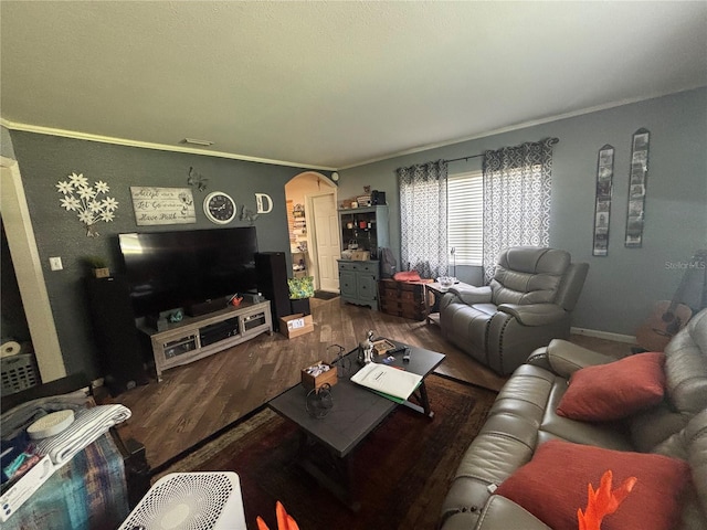 717 Whiteway Dr, Brooksville, FL 34601 - living room featuring arched walkways and wood finished floors