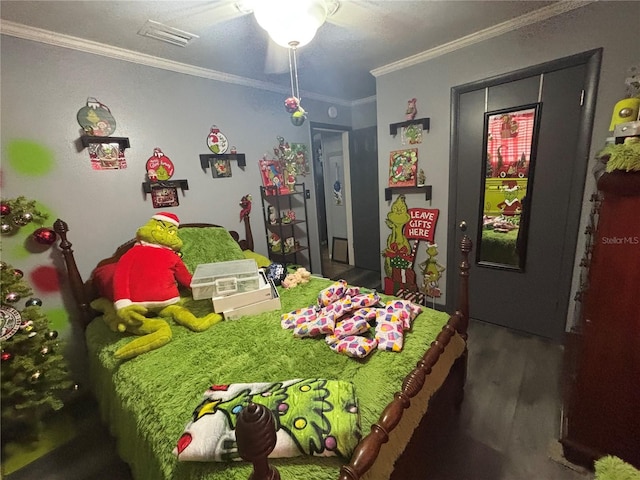 717 Whiteway Dr, Brooksville, FL 34601 - bedroom with wood finished floors and ornamental molding