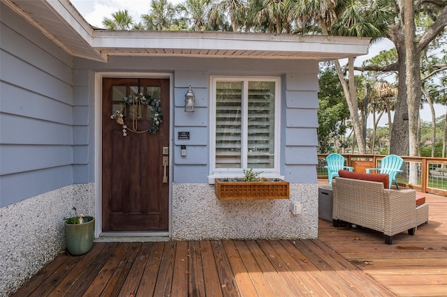 7424 Grand Blvd, New Port Richey, FL 34652 - view of exterior entry with a wooden deck