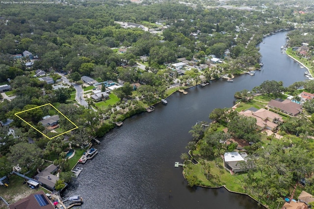 7424 Grand Blvd, New Port Richey, FL 34652 - aerial view of residential area featuring a large body of water and property boundaries highlighted