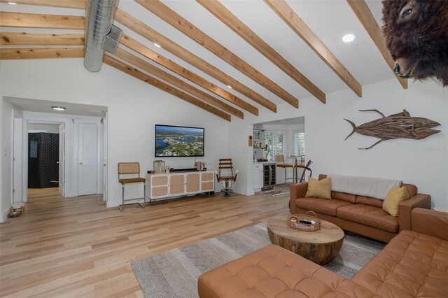 7424 Grand Blvd, New Port Richey, FL 34652 - living room with light wood-style flooring, recessed lighting, beverage cooler, and baseboards
