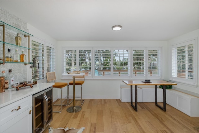 7424 Grand Blvd, New Port Richey, FL 34652 - sunroom featuring beverage cooler