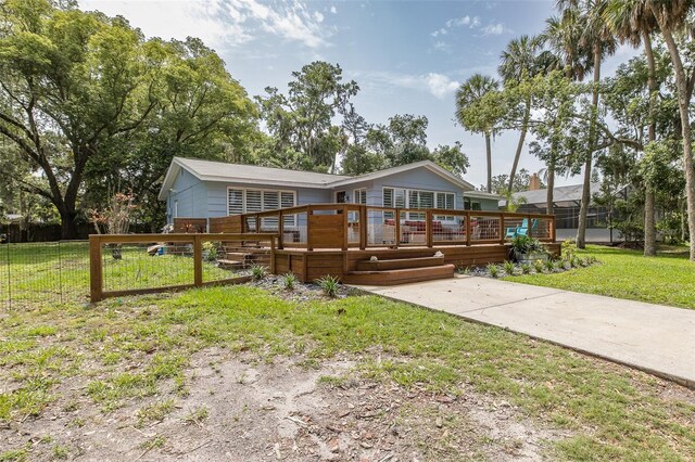 7424 Grand Blvd, New Port Richey, FL 34652 - ranch-style house featuring a wooden deck