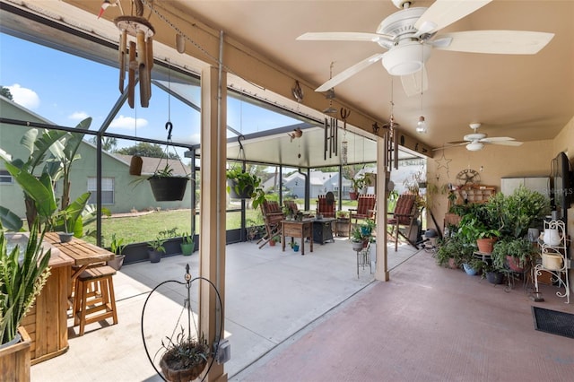 7923 Woburn St, New Port Richey, FL 34653 - view of patio featuring a ceiling fan and glass enclosure