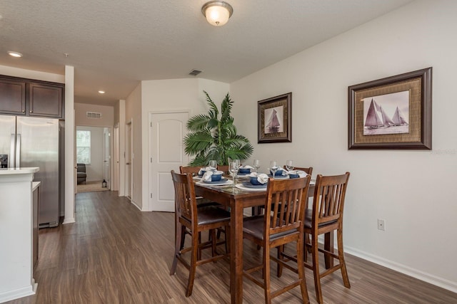 5520 White Marlin Ct, New Port Richey, FL 34652 - dining room with dark wood finished floors, baseboards, and recessed lighting