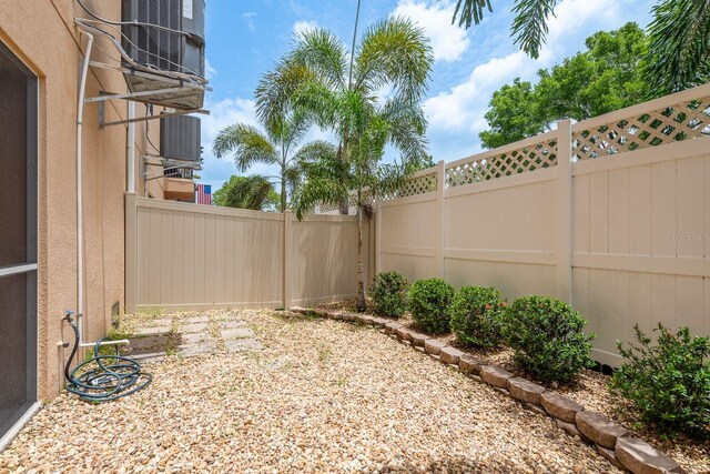 5520 White Marlin Ct, New Port Richey, FL 34652 - fenced backyard featuring central air condition unit