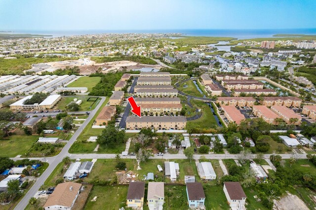 5520 White Marlin Ct, New Port Richey, FL 34652 - aerial overview of property's location featuring a large body of water and nearby suburban area
