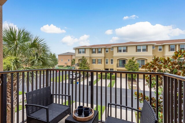 5520 White Marlin Ct, New Port Richey, FL 34652 - balcony featuring a residential view
