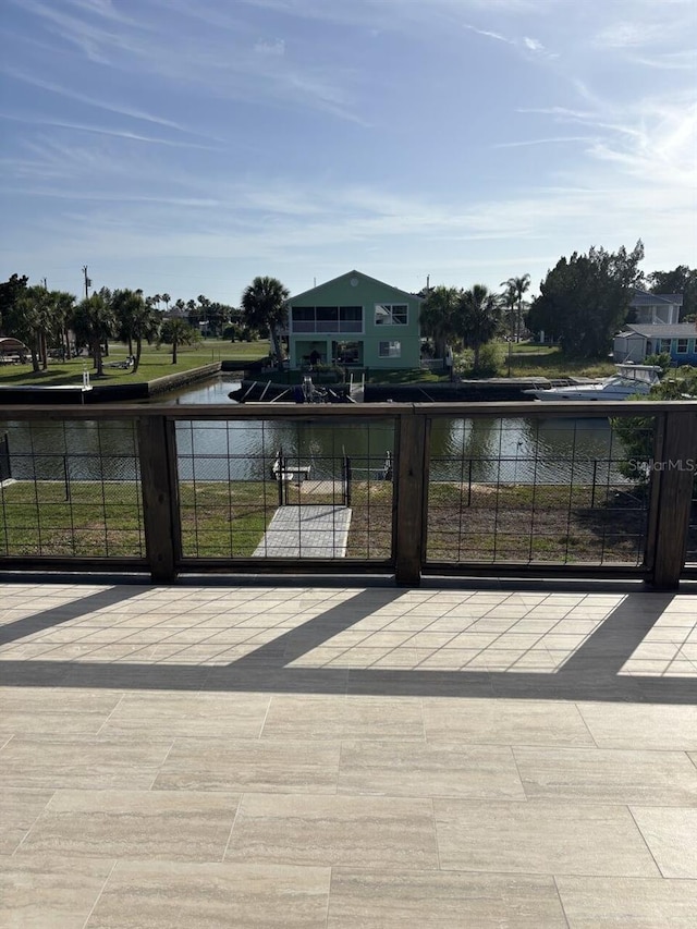 4104 Pine Dale Ct, Hernando Beach, FL 34607 - view of patio with a water view