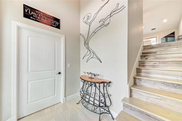 4469 Bahama Dr, Hernando Beach, FL 34607 - stairs featuring baseboards