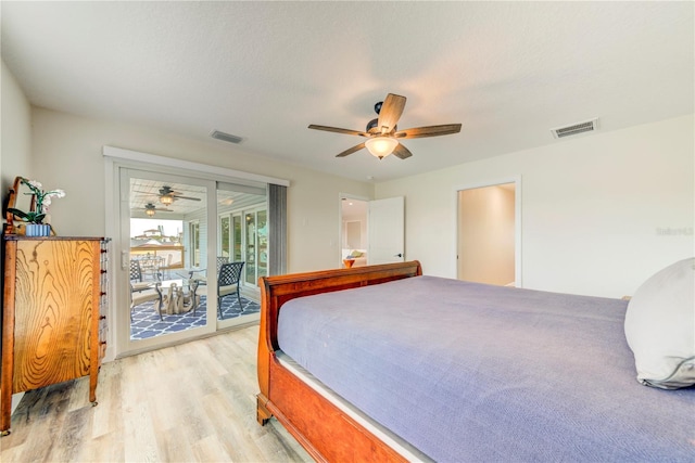 4469 Bahama Dr, Hernando Beach, FL 34607 - bedroom with light wood-style flooring, access to exterior, and a ceiling fan