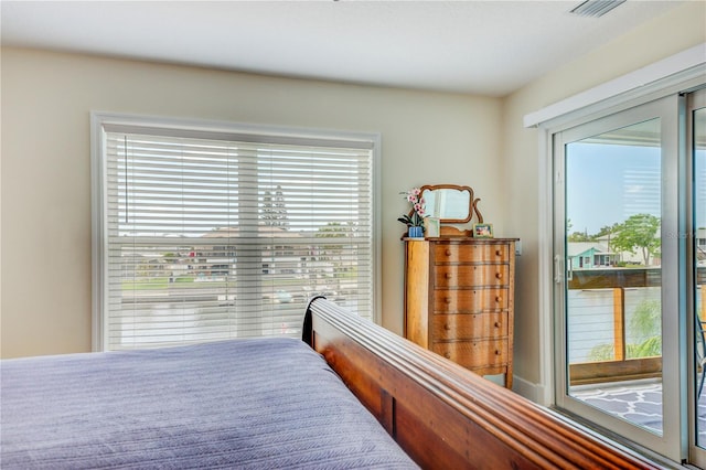 4469 Bahama Dr, Hernando Beach, FL 34607 - bedroom featuring access to outside
