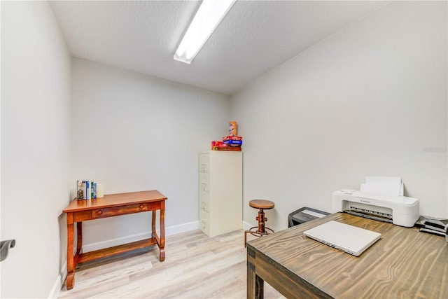 4469 Bahama Dr, Hernando Beach, FL 34607 - office area with light wood-style floors and baseboards