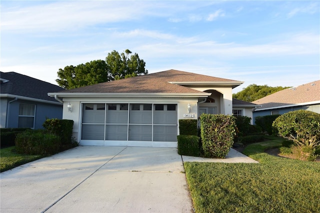 14112 Whitecap Ave, Hudson, FL 34667 - single story home featuring stucco siding, driveway, and a garage