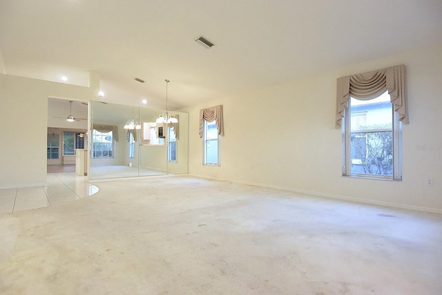 14112 Whitecap Ave, Hudson, FL 34667 - unfurnished room featuring plenty of natural light, baseboards, and light carpet