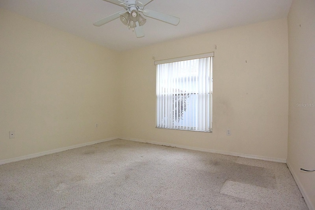 14112 Whitecap Ave, Hudson, FL 34667 - carpeted empty room with ceiling fan and baseboards
