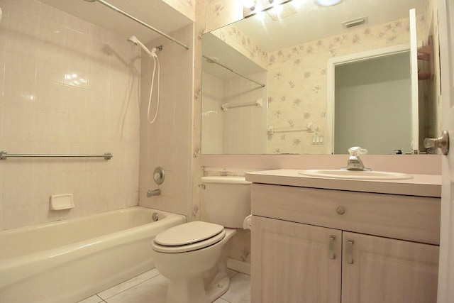 14112 Whitecap Ave, Hudson, FL 34667 - full bathroom with wallpapered walls, tile patterned flooring, shower / washtub combination, toilet, and vanity