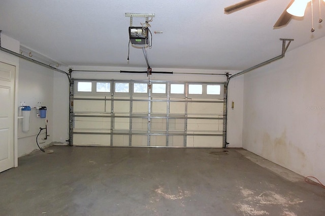 14112 Whitecap Ave, Hudson, FL 34667 - garage featuring a garage door opener
