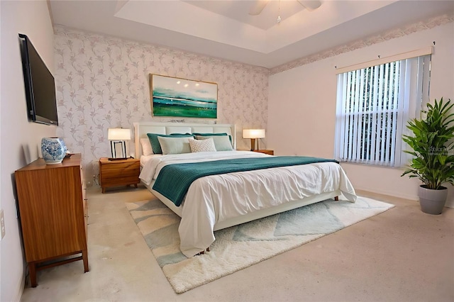14112 Whitecap Ave, Hudson, FL 34667 - bedroom featuring a raised ceiling, wallpapered walls, and baseboards