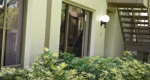 13010 Wedgewood Way Unit A, Hudson, FL 34667 - property entrance with stucco siding