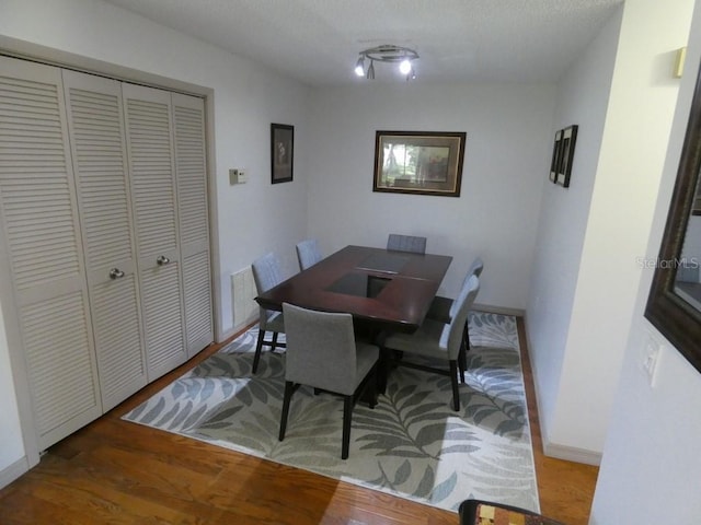 13010 Wedgewood Way Unit A, Hudson, FL 34667 - dining area featuring wood finished floors and baseboards