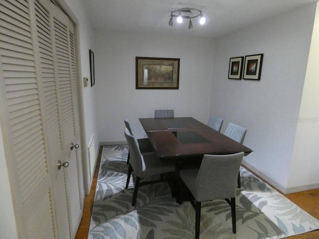 13010 Wedgewood Way Unit A, Hudson, FL 34667 - dining space with baseboards