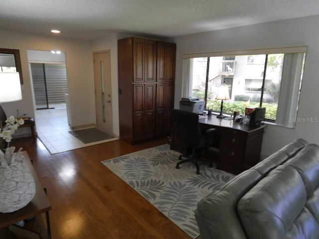13010 Wedgewood Way Unit A, Hudson, FL 34667 - office area with light wood-style floors and recessed lighting