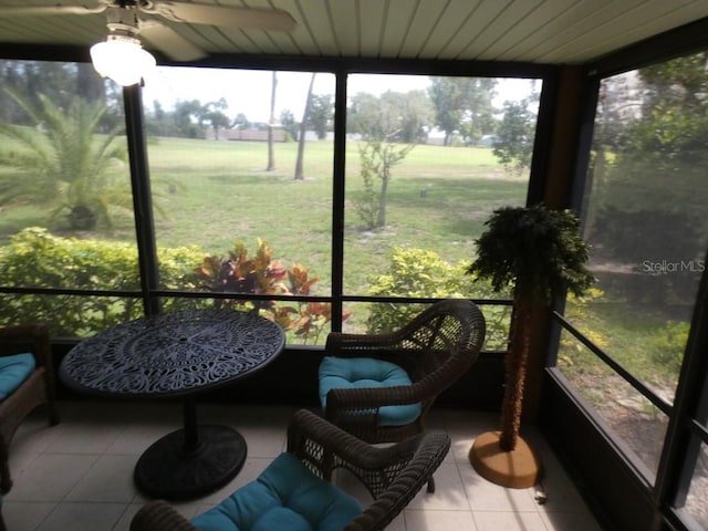 13010 Wedgewood Way Unit A, Hudson, FL 34667 - sunroom featuring ceiling fan and healthy amount of natural light