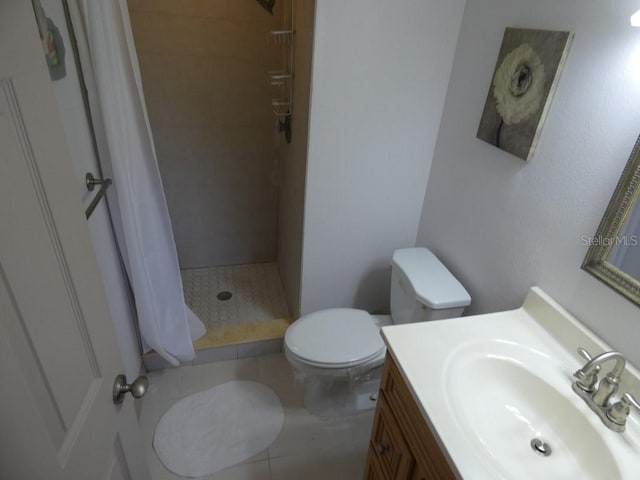 13010 Wedgewood Way Unit A, Hudson, FL 34667 - bathroom featuring a stall shower, toilet, and vanity