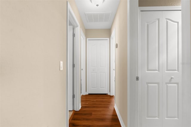 13444 English Parrot Rd, Brooksville, FL 34614 - hallway featuring wood finished floors and baseboards