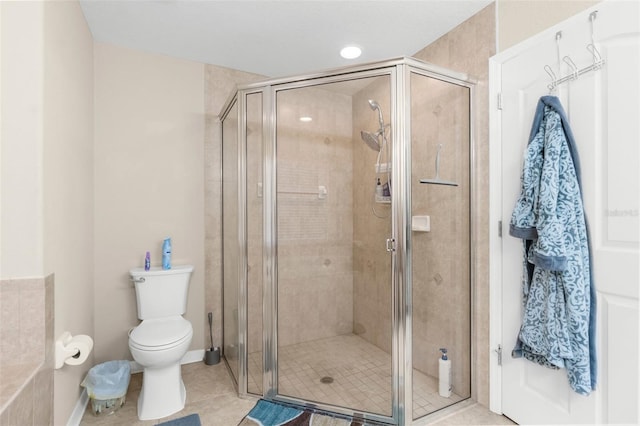 13444 English Parrot Rd, Brooksville, FL 34614 - full bath featuring a stall shower, toilet, and tile patterned floors