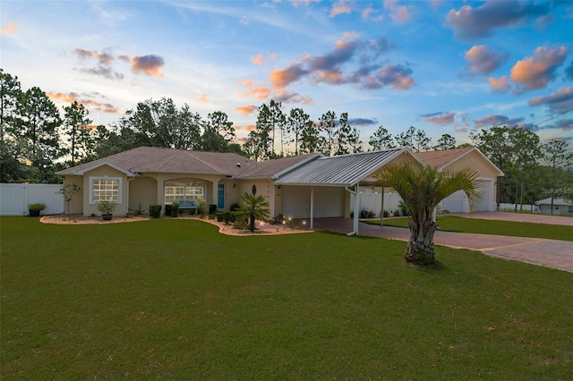 13444 English Parrot Rd, Brooksville, FL 34614 - ranch-style house featuring driveway, an attached garage, and an attached carport