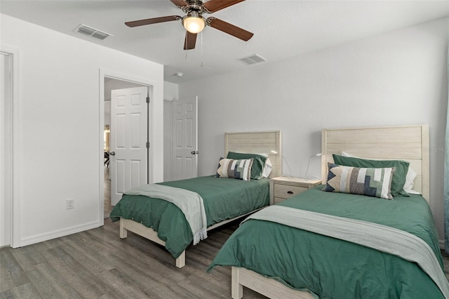 10234 W Middlburg Loop Unit 152, Homosassa, FL 34448 - bedroom featuring wood finished floors, a ceiling fan, and baseboards