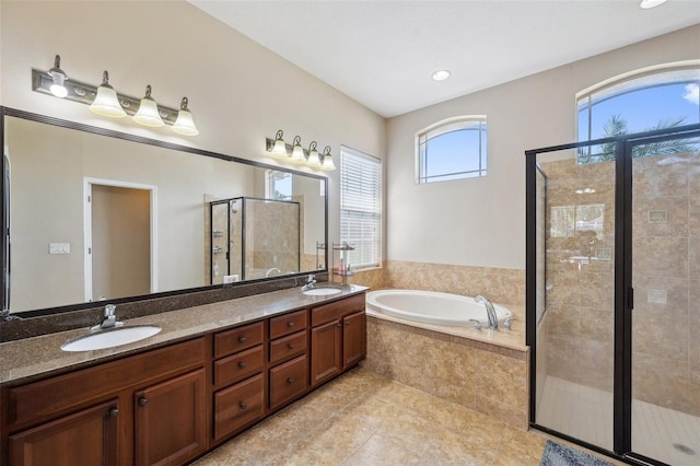 11726 Belle Haven Dr, New Port Richey, FL 34654 - full bathroom with a shower stall, a garden tub, double vanity, tile patterned flooring, and recessed lighting