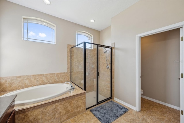 11726 Belle Haven Dr, New Port Richey, FL 34654 - full bath featuring a bath, a stall shower, toilet, tile patterned flooring, and recessed lighting