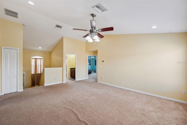 11726 Belle Haven Dr, New Port Richey, FL 34654 - spare room featuring lofted ceiling, carpet floors, ceiling fan, baseboards, and recessed lighting