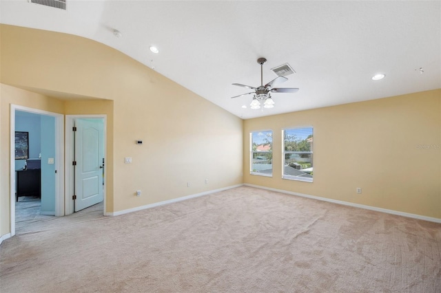 11726 Belle Haven Dr, New Port Richey, FL 34654 - spare room with a ceiling fan, light colored carpet, lofted ceiling, baseboards, and recessed lighting