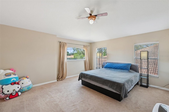 11726 Belle Haven Dr, New Port Richey, FL 34654 - bedroom featuring carpet floors, baseboards, and ceiling fan