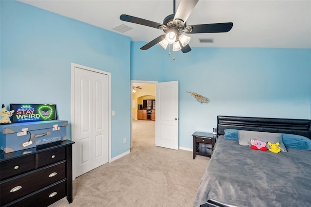 11726 Belle Haven Dr, New Port Richey, FL 34654 - bedroom featuring light carpet, baseboards, ceiling fan, arched walkways, and high vaulted ceiling