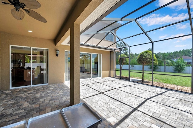 11726 Belle Haven Dr, New Port Richey, FL 34654 - unfurnished sunroom featuring a ceiling fan