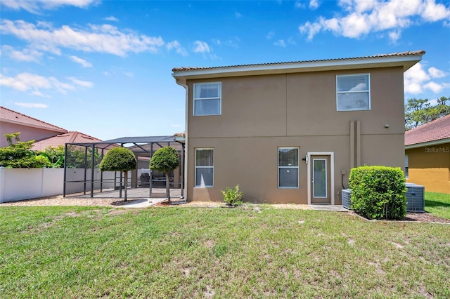 11726 Belle Haven Dr, New Port Richey, FL 34654 - rear view of property featuring a patio area, stucco siding, a lanai, and cooling unit